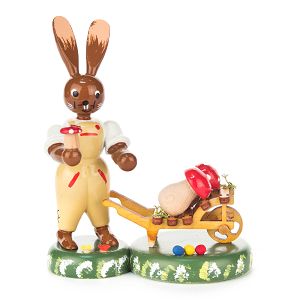 Hase mit Schubkarre und Pilzen